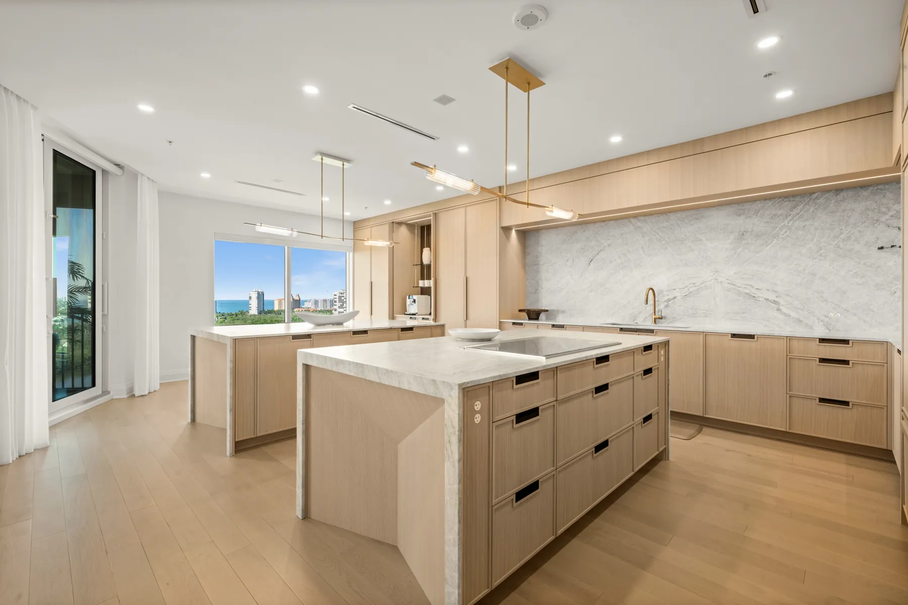 White oak kitchen with marble island