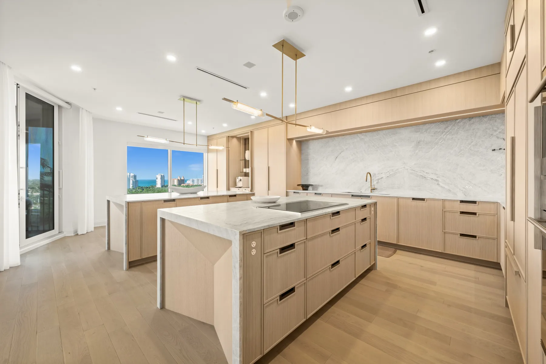 Kitchen with marble backsplash and Gulf view